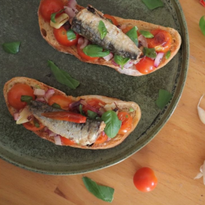 Butter and garlic bruschetta with canned Sardines